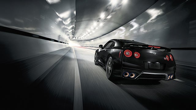 2023 Nissan GT-R seen from behind driving through a tunnel | SouthWest Nissan in Weatherford TX